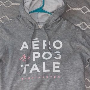 a grey cropped hoodie